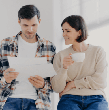 A couple discusses adding a heat pump to their home comfort system