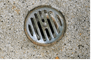 floor drain in a residential Calgary furnace room