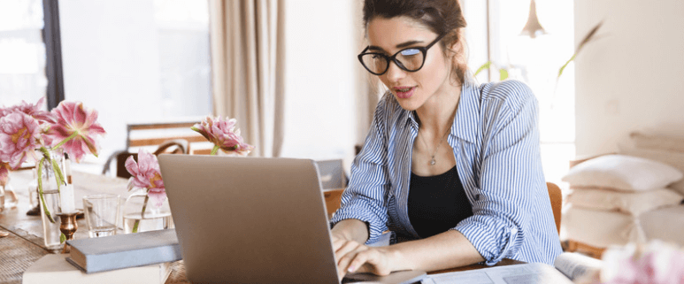 A woman researches heat pumps in Calgary