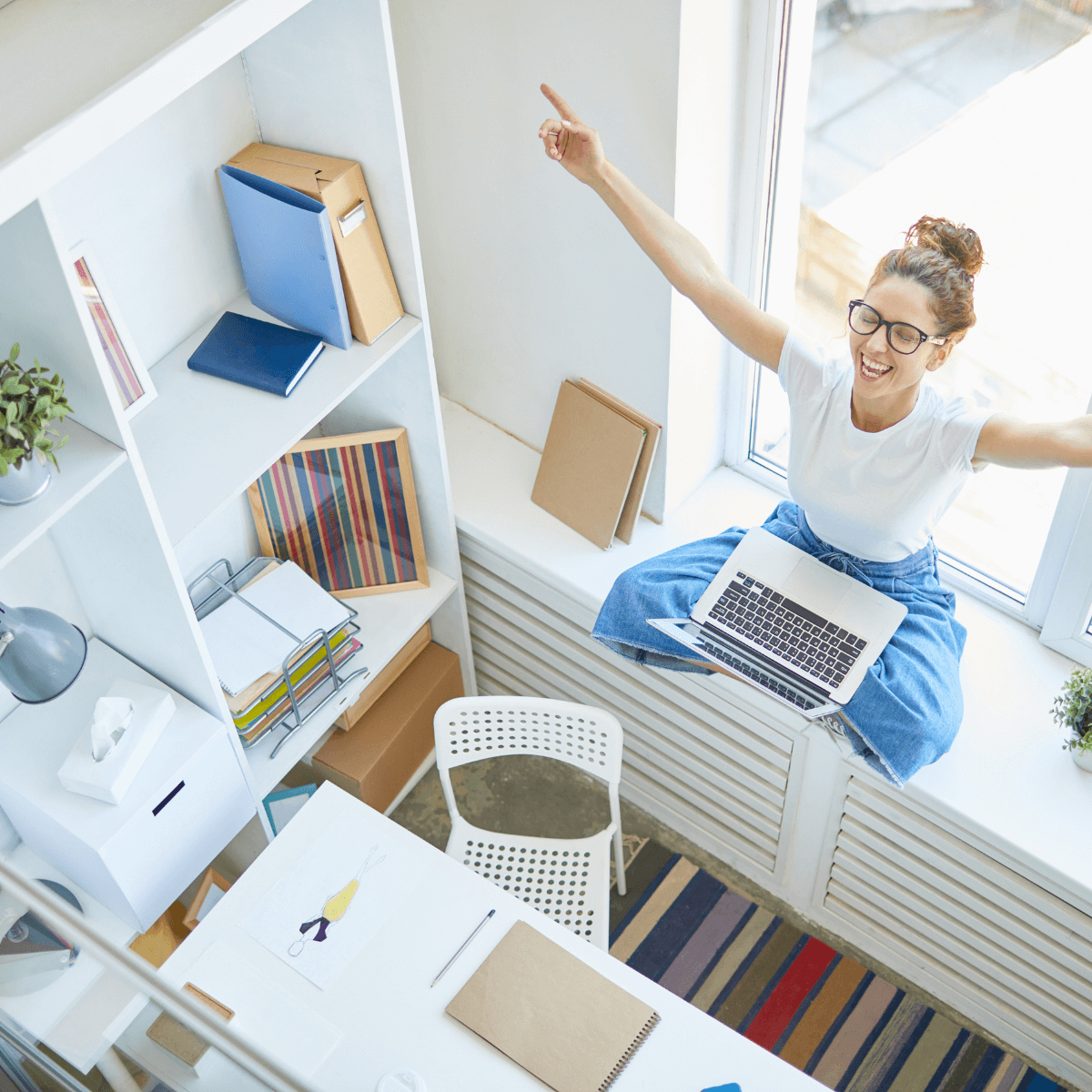 Young woman is excited she is approved for financing a home comfort system