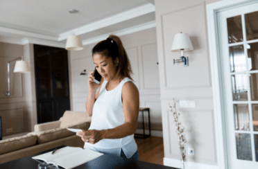 A woman books a duct cleaning